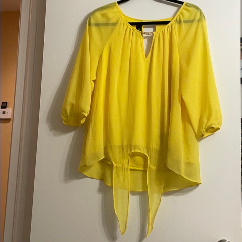 Sheer yellow blouse with lining